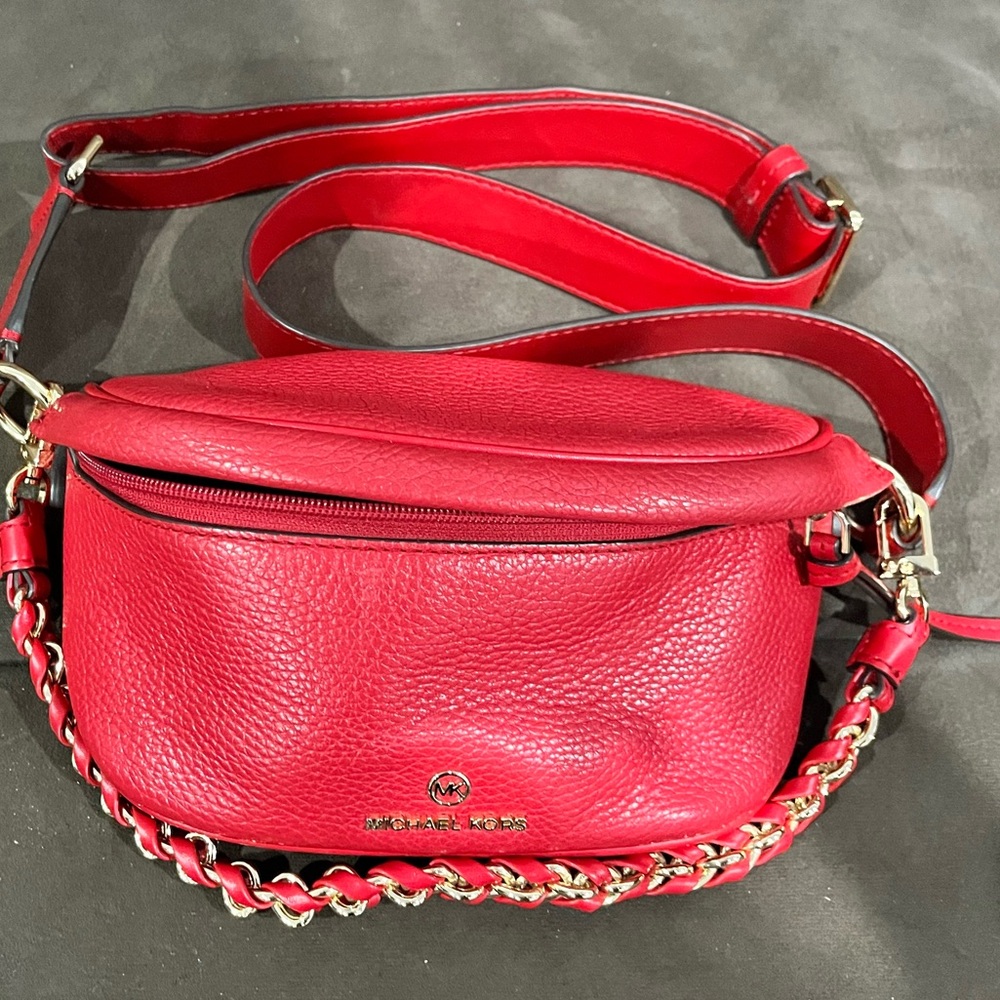 Red crossbody Michael kors bag